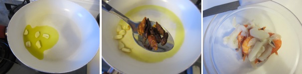 Soffriggete l’aglio in una padella e aggiungete i peperoncini piccanti, cercando di farli sciogliere. Pulite tutto il pesce: tagliate i calamari in anelli; pulite e raschiate le cozze e le vongole; fate lessare il polpo circa 20 minuti, poi spellatelo e tagliatelo a pezzettini; tagliate le antenne ai gamberi.