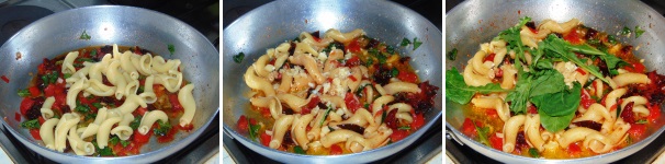 Cuocete la pasta in acqua salata, scolatela al dente e ripassatela in padella con il sugo, quindi unitevi il parmigiano a scaglie e la restante rucola, mantecate e servite subito in tavola. Cuocete la pasta in acqua salata, scolatela al dente e ripassatela in padella con il sugo, quindi unitevi il parmigiano a scaglie e la restante rucola, mantecate e servite subito in tavola.
