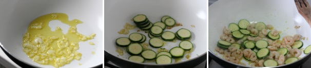 Iniziate mettendo un po’ di olio in un saltapasta, aggiungete la cipolla tagliata sottile e le zucchine tagliate a rondelle sottili. Fate rosolare ed incorporate i gamberi sgusciati.
