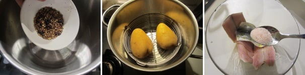 In una pentola versate l’acqua, il sale e le spezie  miste. Mettete il cestello per la cottura al vapore con due patate non sbucciate. In una ciotola mettete le aringhe e cospargete con il sale.