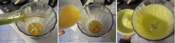 Versate il tuorlo in un mixer ed aggiungete metà del succo di arancia. Iniziate a lavorare il composto ad una velocità media e costante, aggiungendo l’olio a filo, poco alla volta. Dopo qualche minuto la maionese inizierà ad addensarsi.