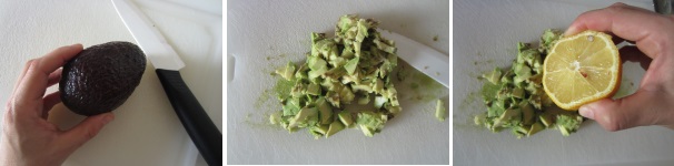 Lavate l‘avocado, tagliatelo a metà e togliete il seme. Estraete la polpa e tagliatela finemente con il coltello. Tagliate un limone a metà e condite subito l’avocado.