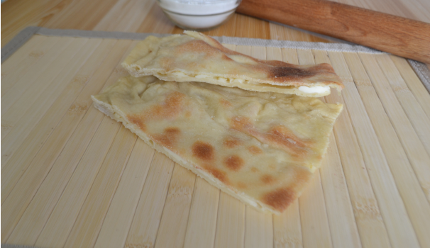 Trascorso il tempo di cottura ecco pronta da gustare la focaccia di Recco preparata con le vostre mani.