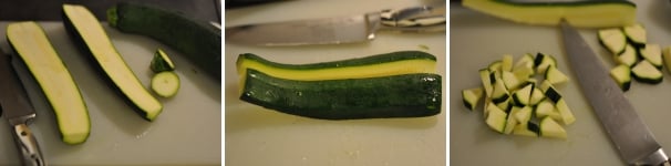 Pulite le zucchine: dopo averle lavate privatele delle due estremità. Tagliatele per la lunghezza poi nuovamente a metà per ogni parte ottenuta. Successivamente tagliate a cubetti le strisce di zucchina.