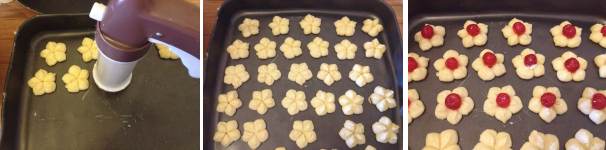 Una volta scelta la vostra trafila preferita ,sparate i biscotti su una teglia, ed in fine decorate con le ciliegie candite.