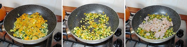 Lavate le zucchine ed asciugatele accuratamente privandole dopo delle due estremità. Tagliatele le zucchine a dadini piccoli e versatele in un tegame, a seguire fate lo stesso con i fiori di zucca adeguatamente puliti e lavati. Aromatizzate le verdure con l’aglio tritato finissimo, aggiungete ancora un filo di olio extravergine di oliva ed una presa di sale quindi accendete il fuoco e cucinate il tutto mescolando all’occorrenza. Quando le zucchine si saranno ammorbidite aggiungete i gamberi sgusciati.