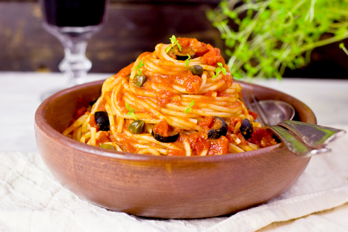 Spaghetti alla puttanesca (selective focus) spaghetti alla puttanesca