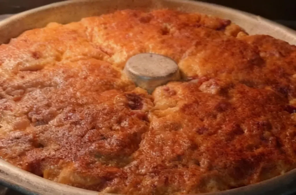 Babà rustico napoletano soffice appena sfornato con salumi e formaggi, ricetta verace di Marianna Gaito