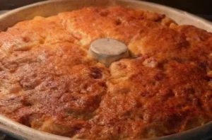 Babà rustico napoletano soffice appena sfornato con salumi e formaggi, ricetta verace di Marianna Gaito