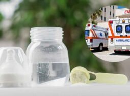 Confezione di latte in polvere e biberon su un tavolo da cucina per allerta neonati