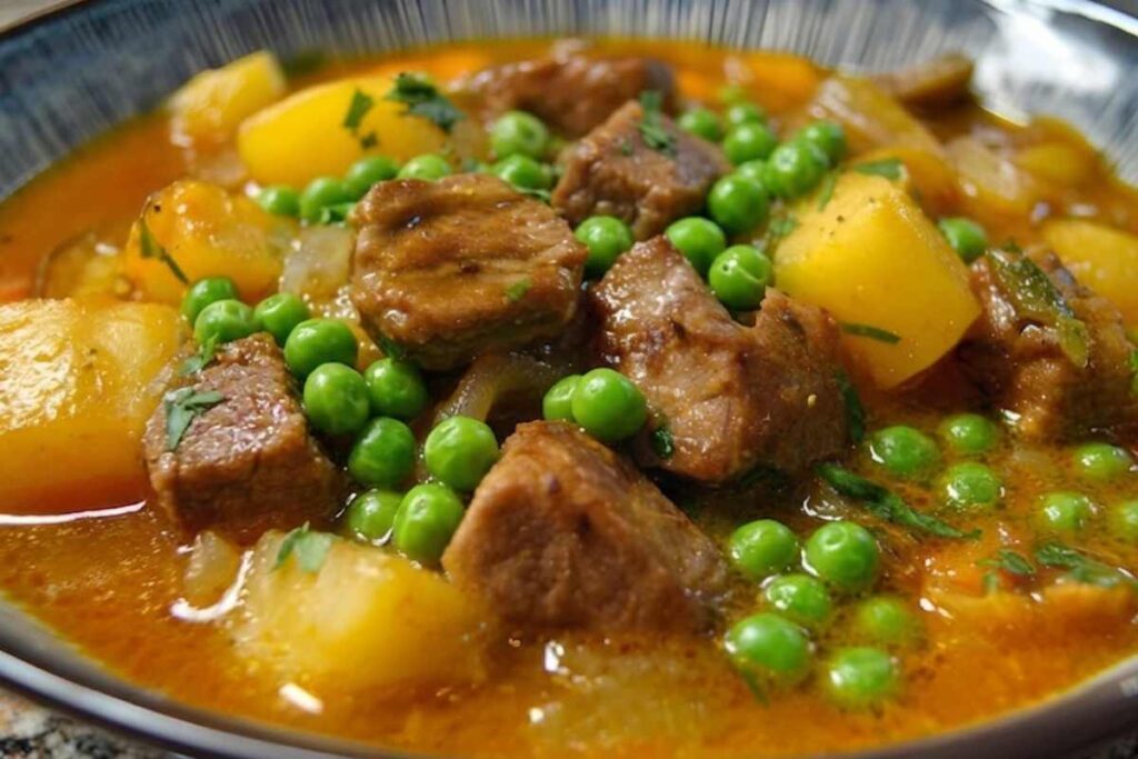spezzatino tenero con patate e piselli